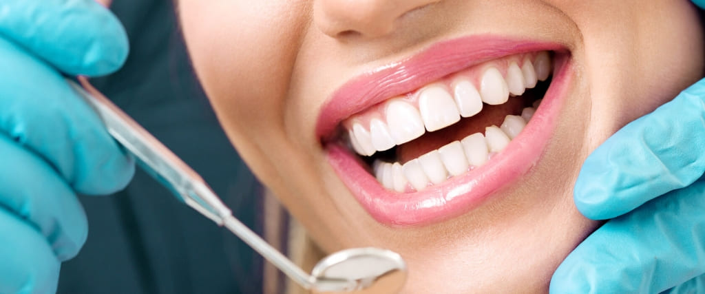 Новые стоматологические материалы для лечения стираемости зубов